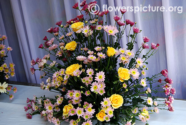 Pink chrysanthemum and yellow rose bouquet
