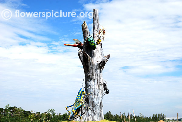 Tree statue with insects